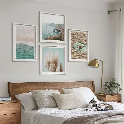 Posterset met lijsten strandgolven met gras en een hoed