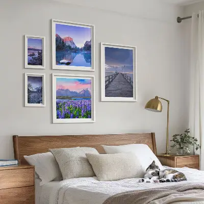 Gallery wall met berg- en kustlandschappen