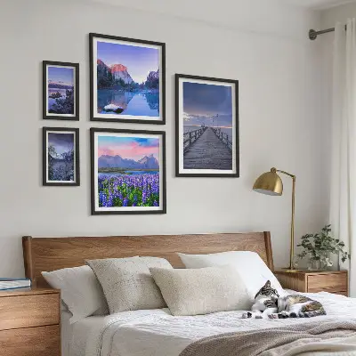 Gallery wall met berg- en kustlandschappen