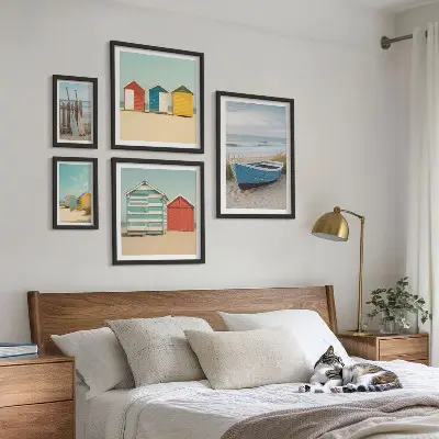 Wanddecoratie compositie uitzicht op zee met huizen en boten