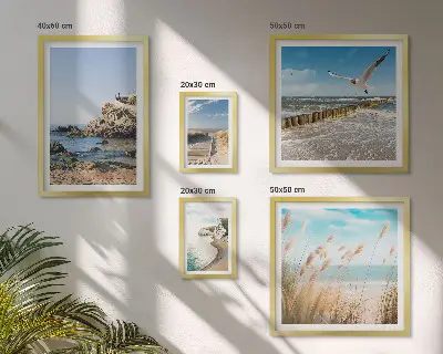 Gallery wall met strandlandschappen aan zee