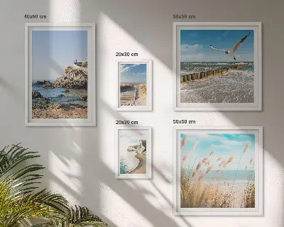 Gallery wall met strandlandschappen aan zee