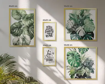Gallery wall met plantenmotieven en boho citaten
