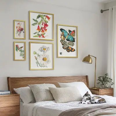 Wanddecoratie compositie met bloemen, vlinders, vogels en vintage elementen