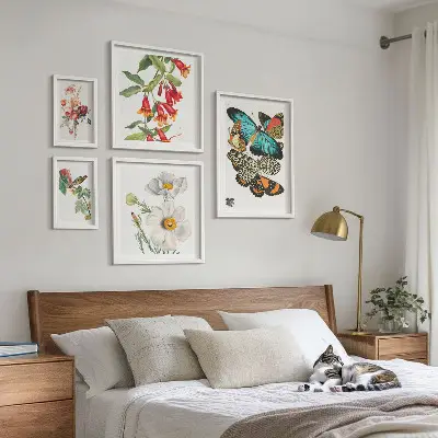 Wanddecoratie compositie met bloemen, vlinders, vogels en vintage elementen