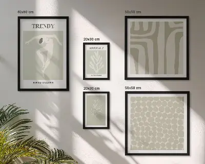 Gallery wall met stijlvolle abstracte groene afbeeldingen