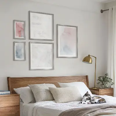 Wanddecoratie compositie met pastelkleurige aquareltexturen