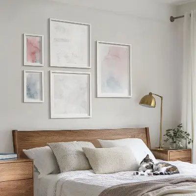 Wanddecoratie compositie met pastelkleurige aquareltexturen