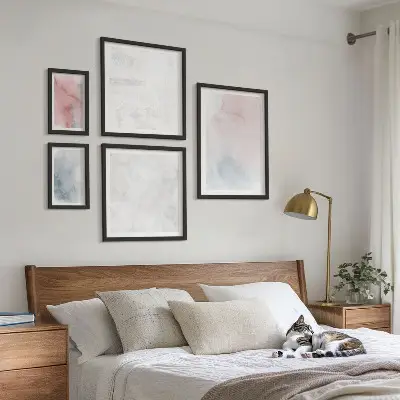 Wanddecoratie compositie met pastelkleurige aquareltexturen