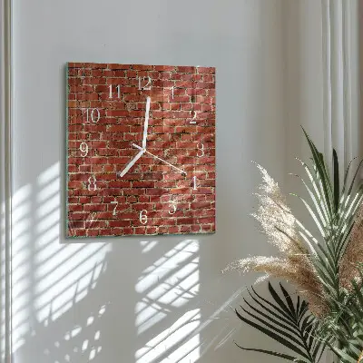 Vierkante glazen klok Bakstenen muur