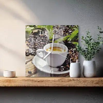 Vierkante glazen wandklok Een kopje koffie