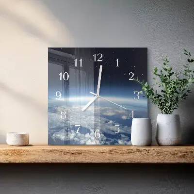 Vierkante glazen klok Het universum van de aarde