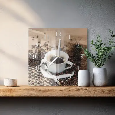 Vierkante glazen wandklok Een kopje koffie