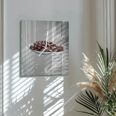 Vierkante glazen klok Een lepeltje koffie