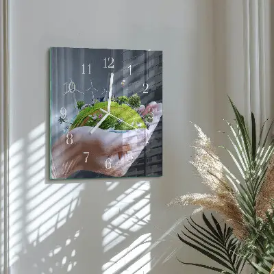Moderne wandklok glas vierkant Aarde in de hand