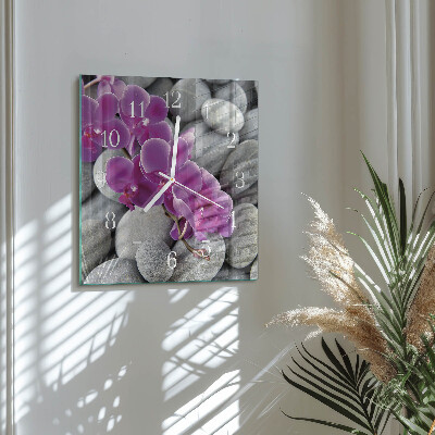 Vierkante glazen wandklok Stenen en orchidee