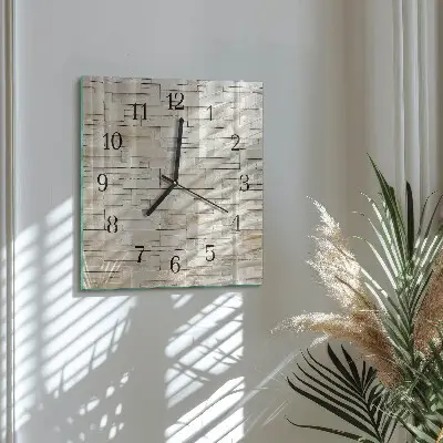 Vierkante glazen klok Stenen muur