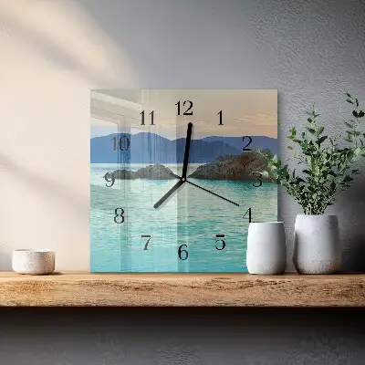 Vierkante glazen wandklok Zee-eiland