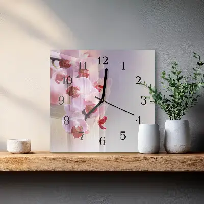 Vierkante glazen wandklok Orchidee