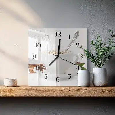 Vierkante glazen wandklok Een kopje anijs