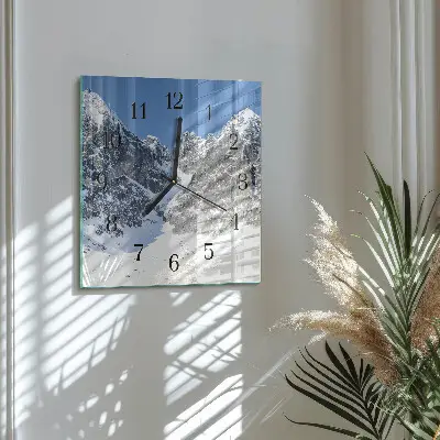 Vierkante glazen wandklok Bergen in de winter