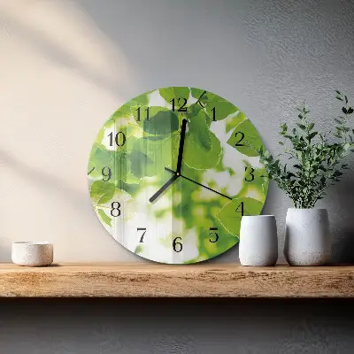 Klok glas met opdruk rond Bladeren