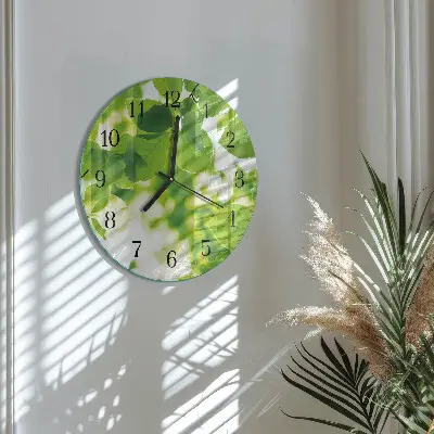 Klok glas met opdruk rond Bladeren