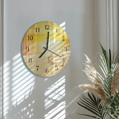 Klok glas met opdruk rond Hart in het zand