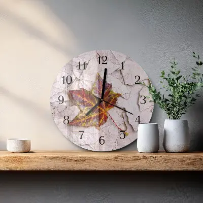 Klok glas met opdruk rond Esdoornblad