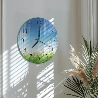 Klok glas met opdruk rond Gras