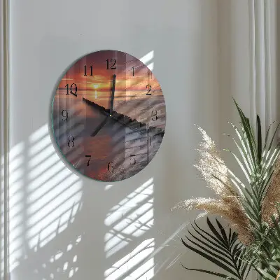 Klok glas met opdruk rond Zon van de zee