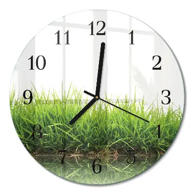 Klok glas met opdruk rond Gras