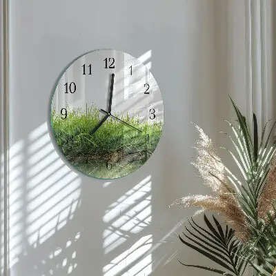 Klok glas met opdruk rond Gras