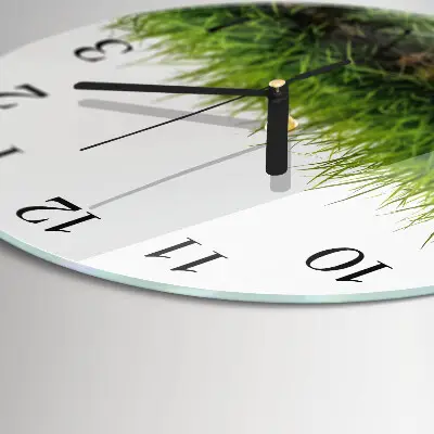 Klok glas met opdruk rond Gras