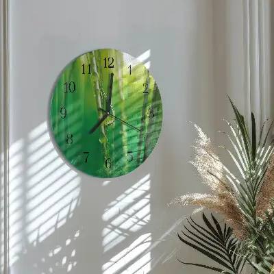 Ronde glas klok Druppels op het gras