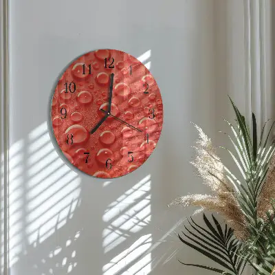 Klok glas met opdruk rond Waterdruppels