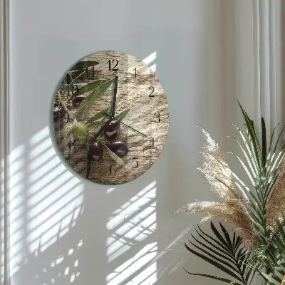 Klok glas met opdruk rond Olijven