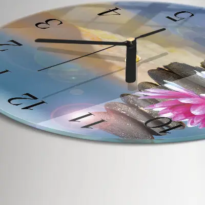 Klok glas met opdruk rond Stenen in het water