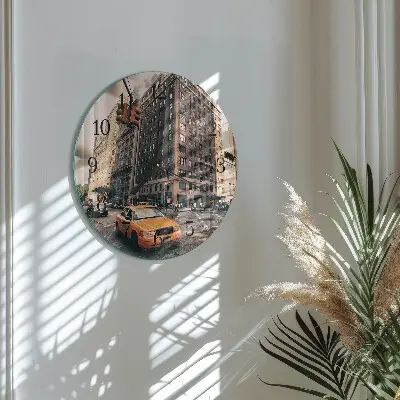 Klok glas met opdruk rond Taxi