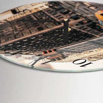 Klok glas met opdruk rond Taxi