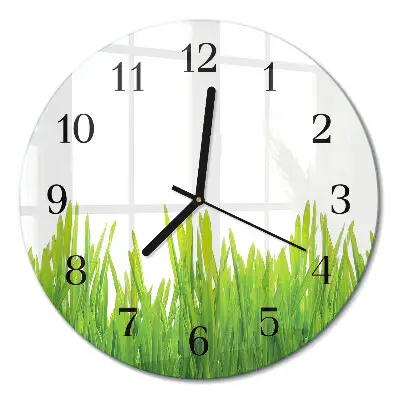 Klok glas met opdruk rond Gras