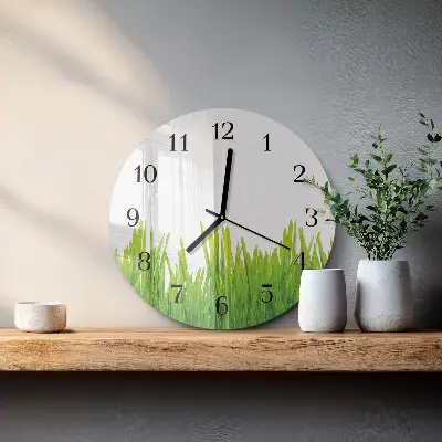 Klok glas met opdruk rond Gras