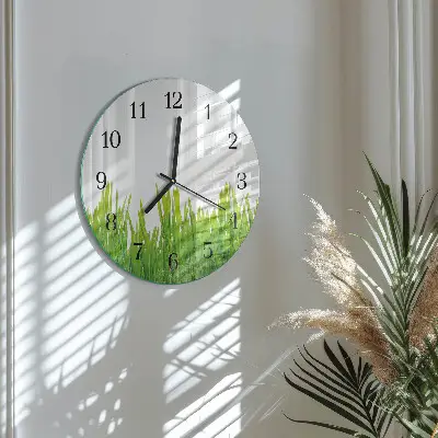 Klok glas met opdruk rond Gras