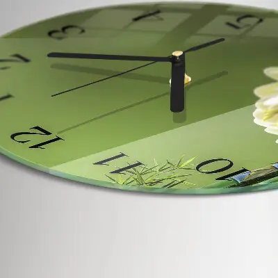 Klok glas met opdruk rond Lelie