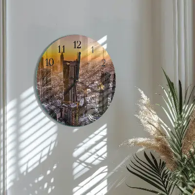 Klok glas met opdruk rond Zonsondergang