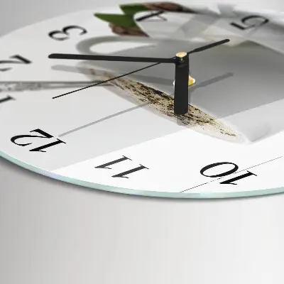 Ronde glazen wandklok Een kopje anijs