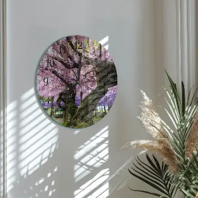 Klok glas met opdruk rond Bomen