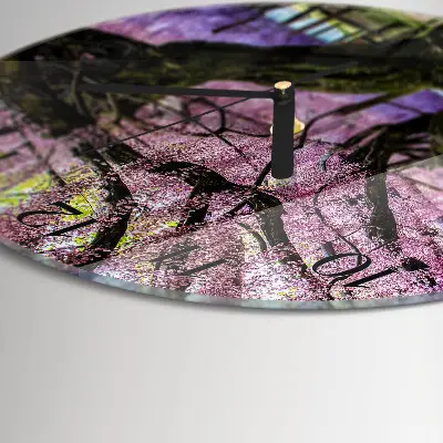 Klok glas met opdruk rond Bomen