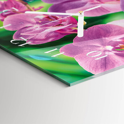 Verticale moderne glazen wandklok Orchideeën