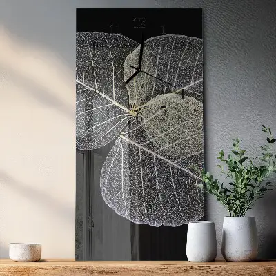 Verticale moderne glazen wandklok Plantenbladeren